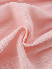 Blush pink mesh fabric detail on a toddler dress