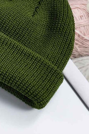 Olive ribbed knit beanie with a turn-up cuff
