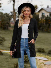 Longline black ribbed knit button-down cardigan with pockets and a V-neck.