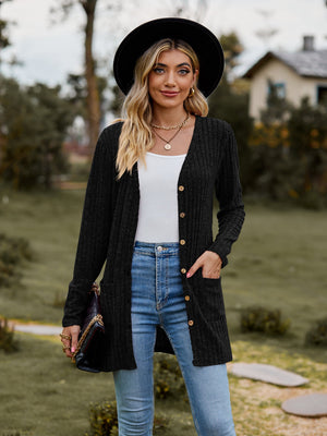 Longline black ribbed knit button-down cardigan with pockets and a V-neck.