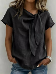 Black relaxed fit shirt with bow-tie neck and short sleeves.