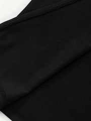 Black off-shoulder maxi dress detail showing fabric texture and stitching.