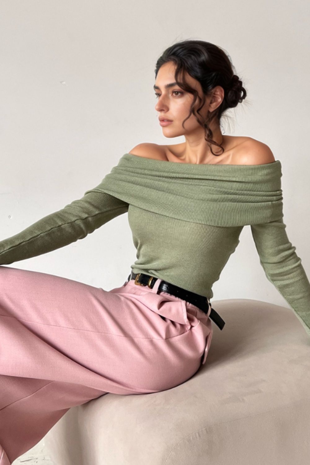 Sage ribbed knit off-the-shoulder top with long sleeves.