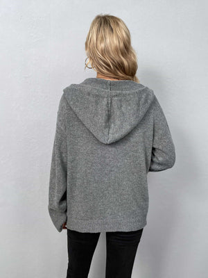 Gray knit hooded cardigan with button front, shown from the back.