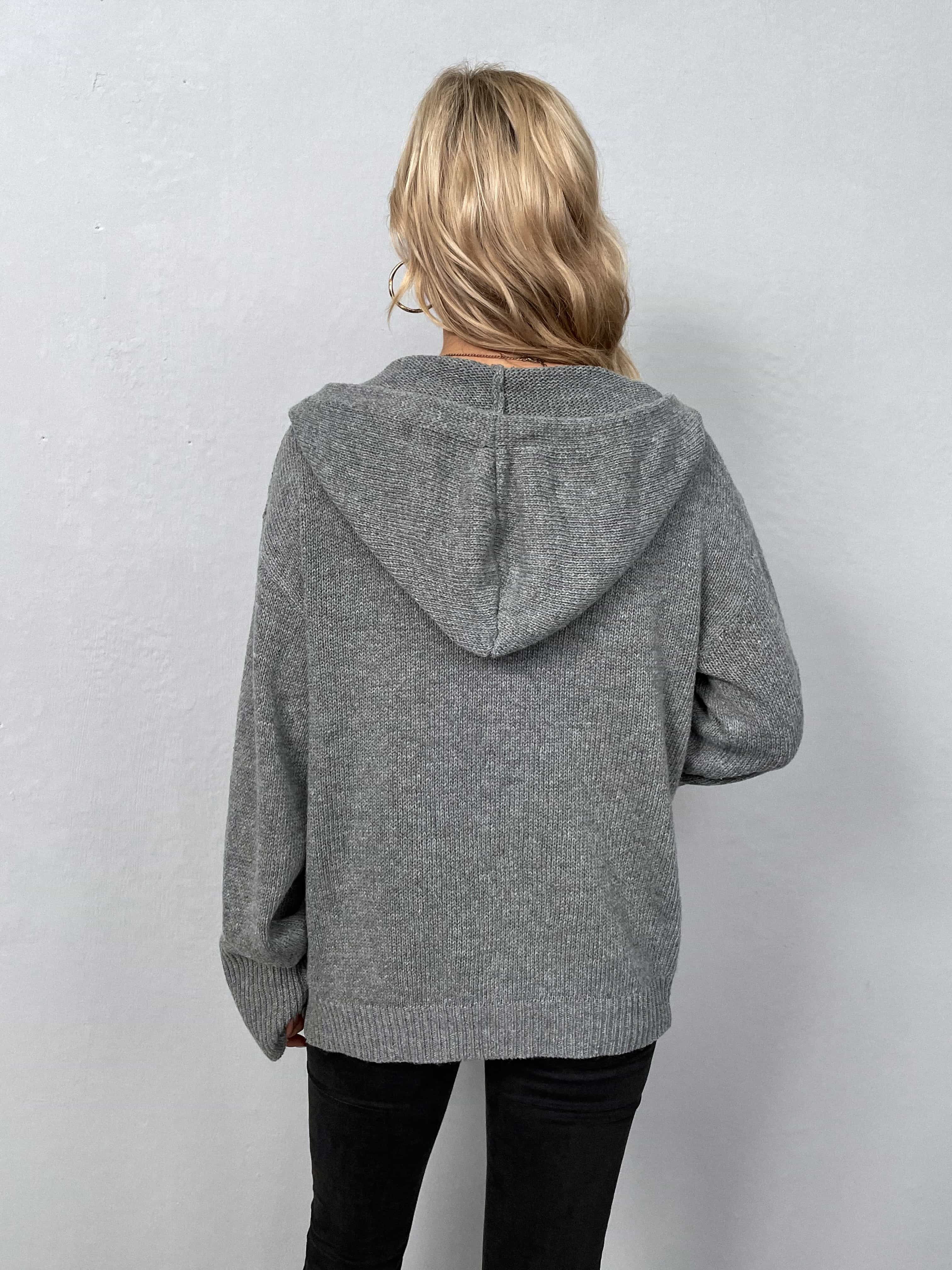 Gray knit hooded cardigan with button front, shown from the back.
