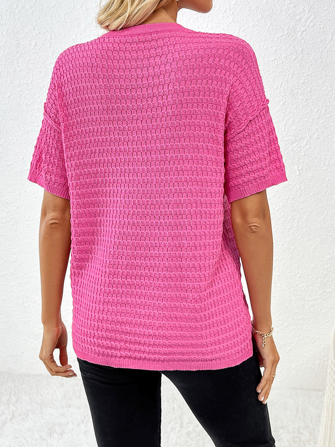 Hot Pink textured knit t-shirt with short sleeves and a boxy silhouette.