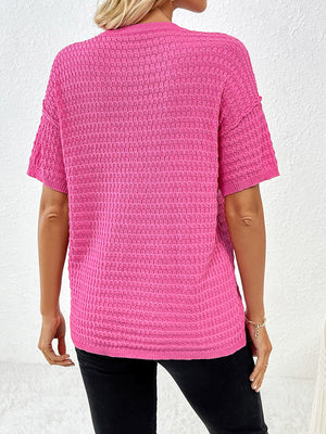 Hot Pink textured knit t-shirt with short sleeves and a boxy silhouette.