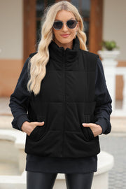 Black corduroy padded funnel neck vest with zip front and pockets