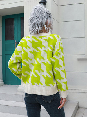 Geometric houndstooth knit cardigan in lime and white acrylic with V-neck and ribbed trim.