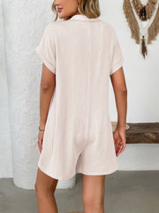 Ribbed knit romper in Eggshell with short sleeves and collar.