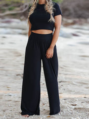 Black pleated waist crop top and wide leg pants set