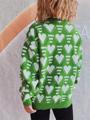 Neon green acrylic knit jumper with white geometric heart pattern.