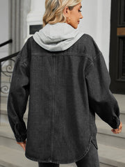 Black oversized denim jacket with hood and buttoned cuffs, casual trucker style.