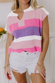 Colorblock polo knit top in pink and purple stripes with a v-neck and short sleeves.