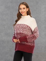 Colorblock knit turtleneck sweater in cream, wine, and speckled wine acrylic with defined panels.
