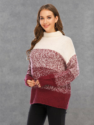 Colorblock knit turtleneck sweater in cream, wine, and speckled wine acrylic with defined panels.
