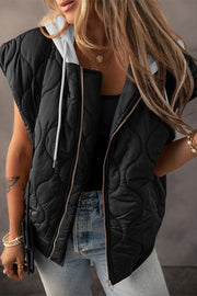 Black quilted hooded sleeveless jacket with white drawstring and zip front.
