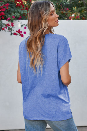 Dusty blue dolman sleeve blouse with perforated trim detail