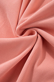 Pink corduroy fabric detail of a lounge set