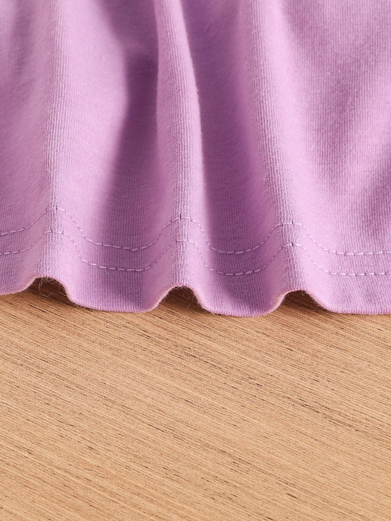 Violet cotton blend toddler crop top hem detail with wavy stitching