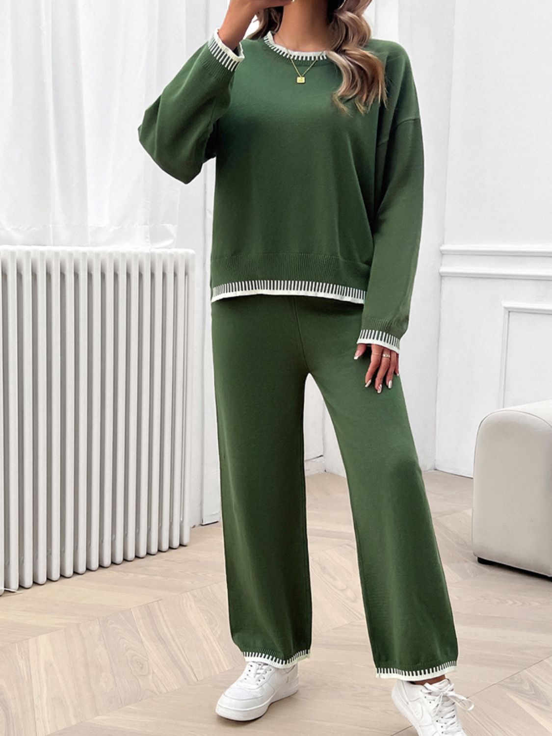 Army green knit lounge set with white ribbed trim on neckline, cuffs, and hem.