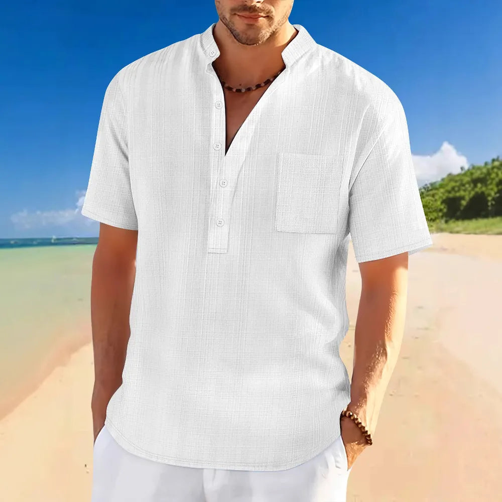 White textured linen henley shirt with mandarin collar and chest pocket.