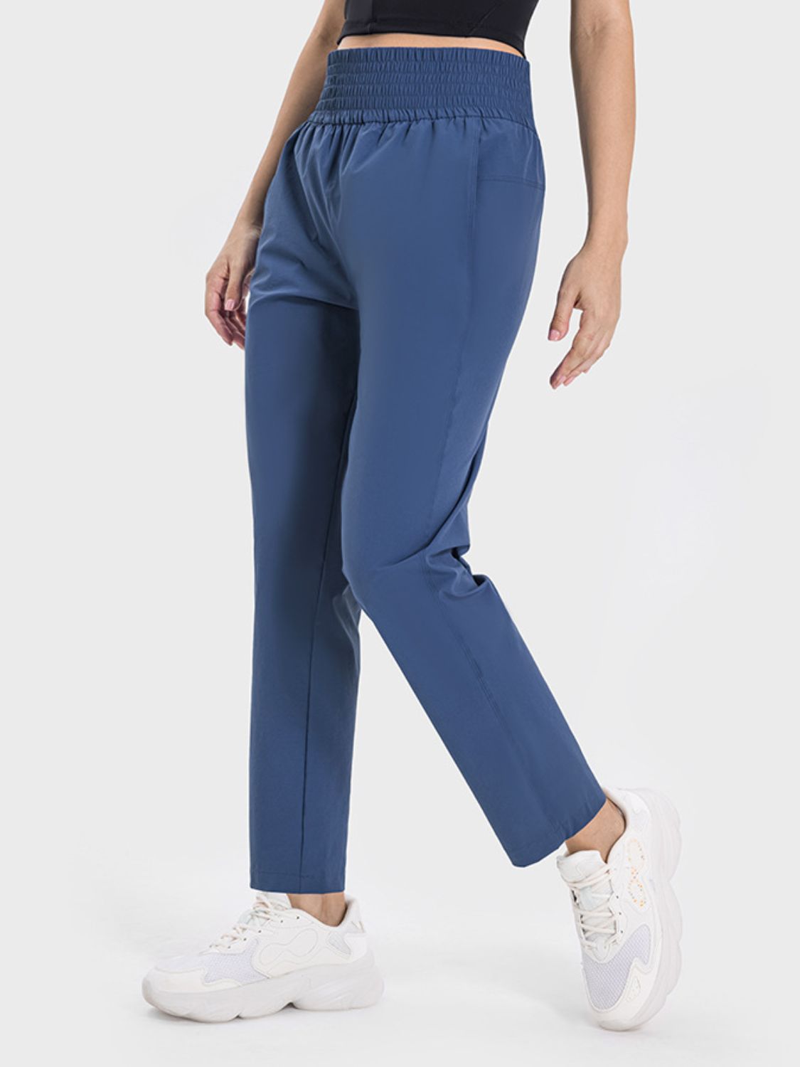 Peacock blue performance trousers with elastic waistband and straight leg