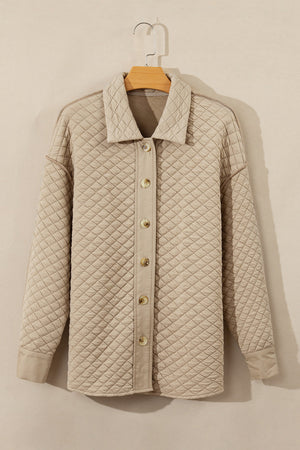 Beige diamond quilted oversized button-up jacket with a collared neckline.