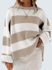 Striped oversized knit sweater in white and khaki with crew neck and cuffed sleeves.