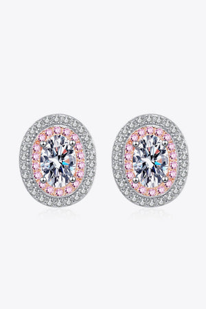 Halo moissanite stud earrings with pink accents and white diamond halo.