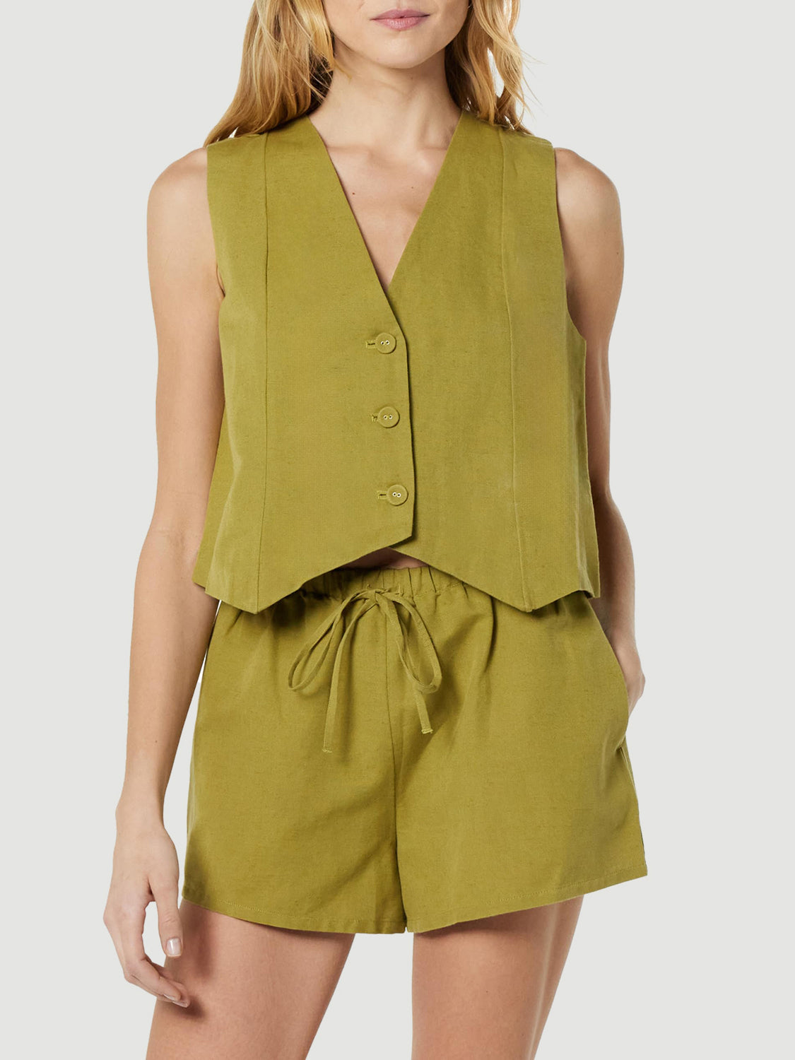 Yellow-green linen vest and drawstring shorts set with button detail.