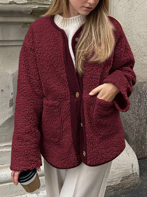 Burgundy teddy-texture button-up jacket with corduroy trim and pockets.