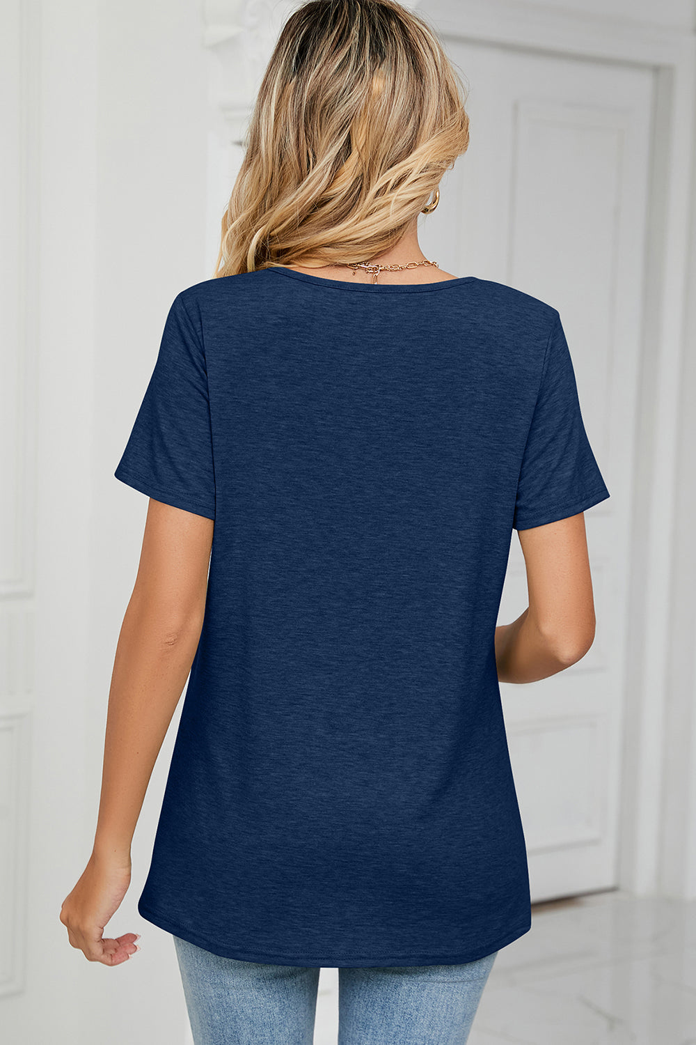 Dark Blue V-neck jersey tee with short sleeves and a ruched detail.