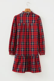 Red tartan mini dress with frilly collar, button-down front, and tiered skirt.