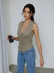 Tailored houndstooth bustier vest in mocha with button front and deep V-neck.
