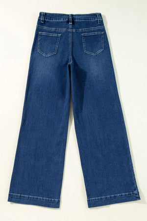 Medium wash denim wide leg jeans with back pockets and buttoned closure.