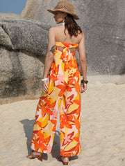Floral print strapless jumpsuit in tangerine with tie back detail