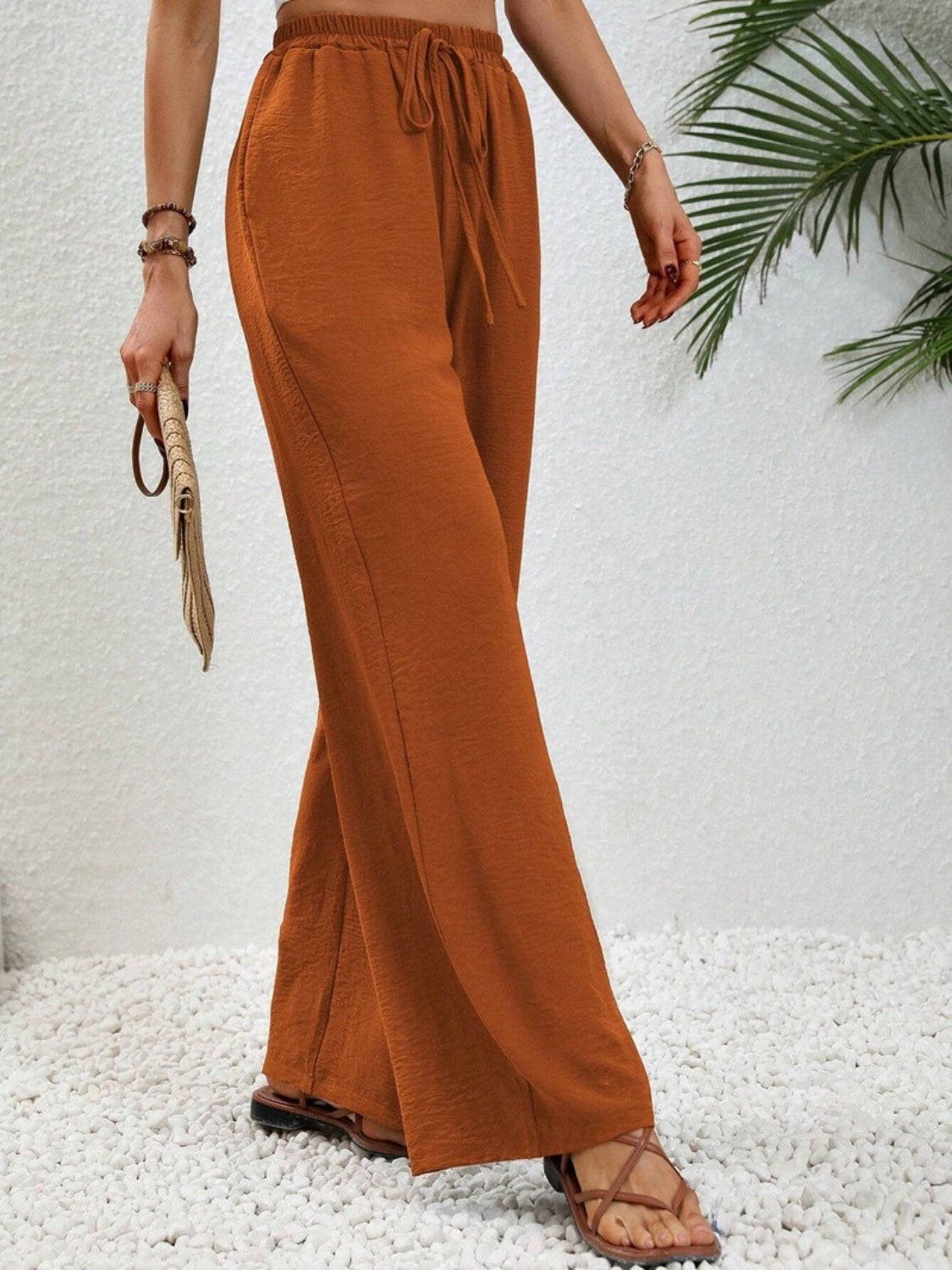 Textured palazzo trousers in caramel with a drawstring waist and wide leg