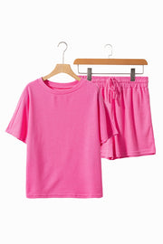 Hot Pink waffle knit co-ord set with short sleeve top and drawstring shorts.