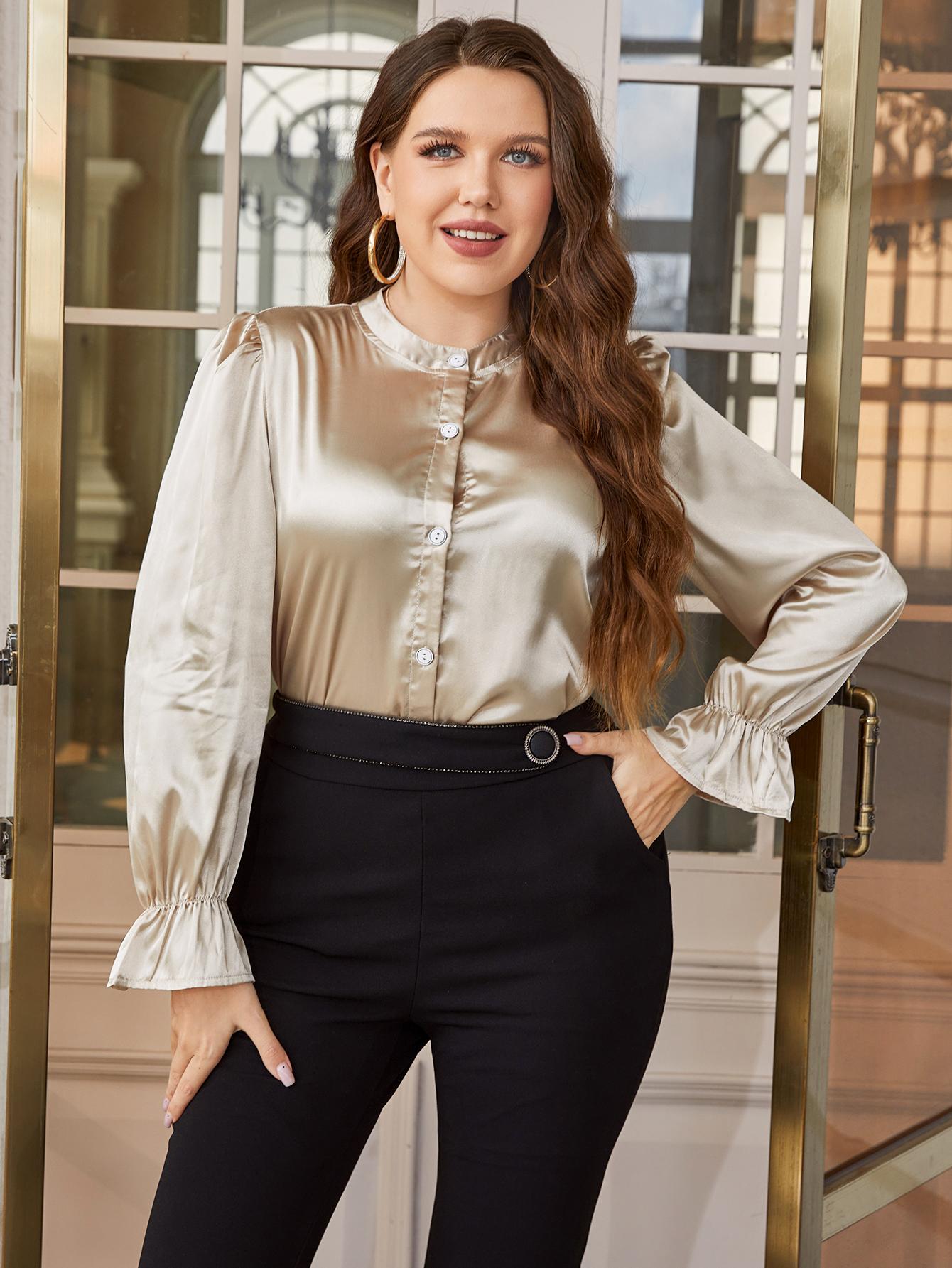 Gold satin blouse with mandarin collar, ruffles, and button front