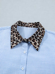 Blue striped button-down shirt with leopard print collar detail