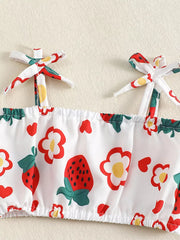 Baby set with strawberry and flower print, featuring tie straps and smocked hem.