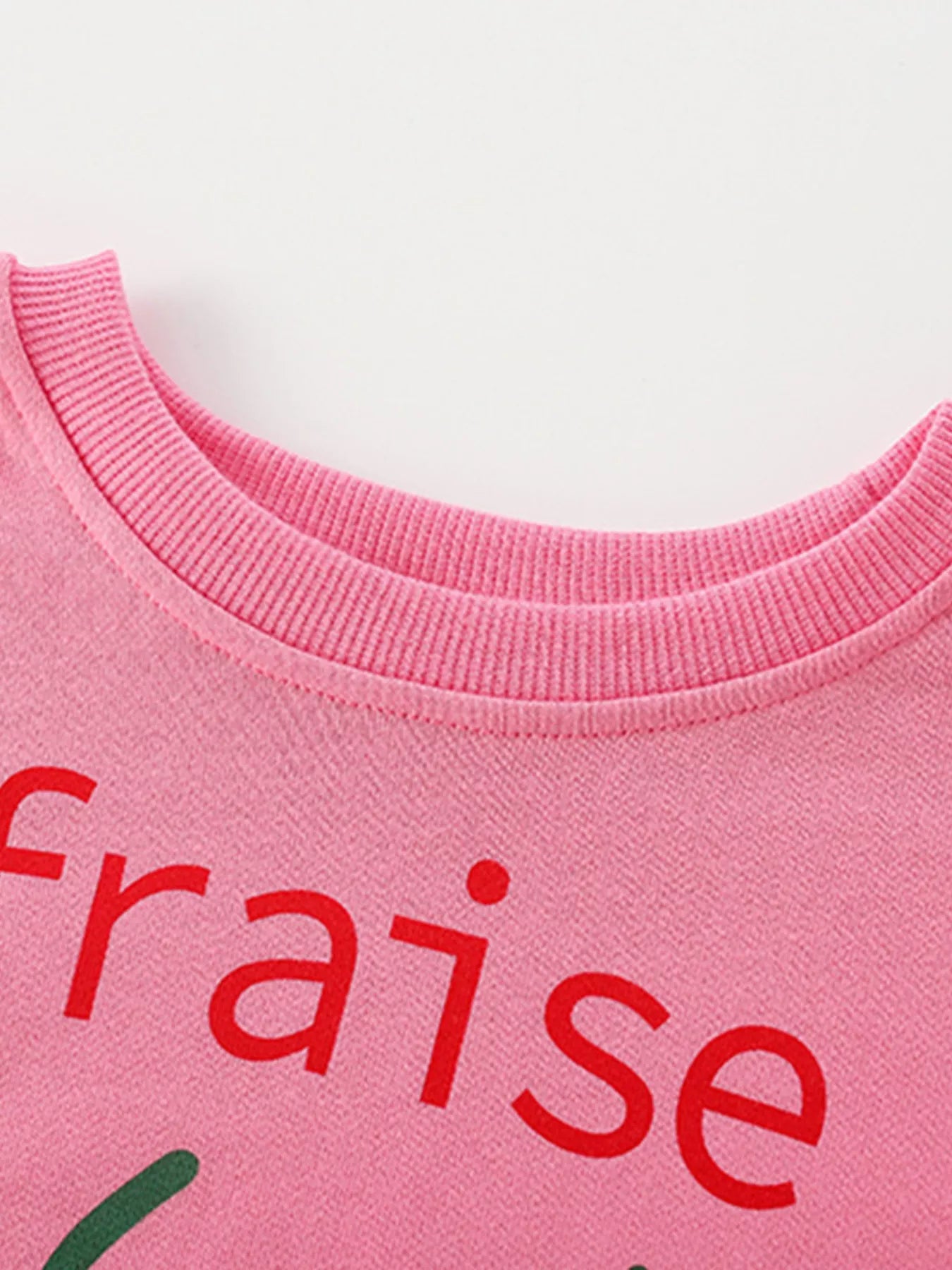 Hot pink cotton sweatshirt with strawberry graphic and text detail