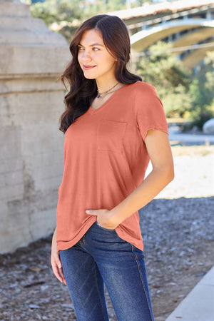 V-neck pocket tee in watermelon pink with short sleeves and a relaxed fit.