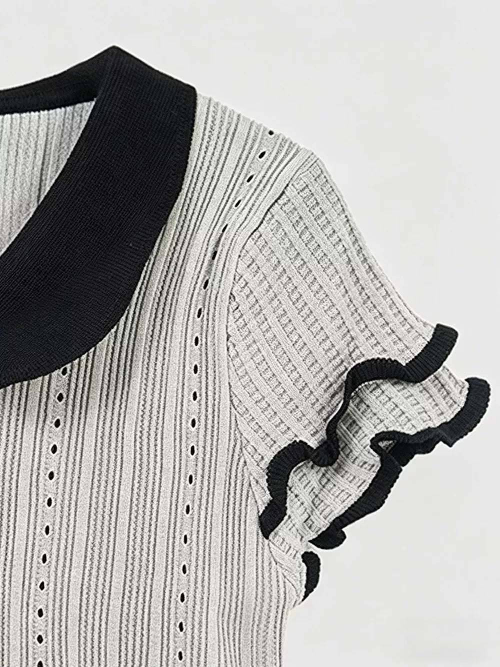 Gray maternity t-shirt with black collar and ruffled sleeves
