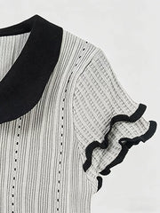 Gray maternity t-shirt with black collar and ruffled sleeves