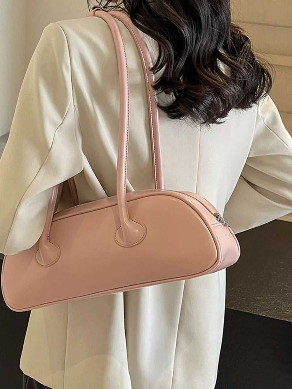 Pink pu leather shoulder bag with double straps and zipper closure