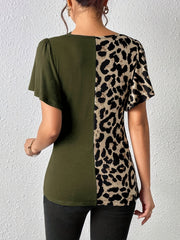Moss green asymmetric top with leopard print panel and short sleeves.