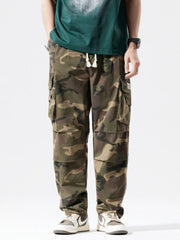 Casual cargo pants in camouflage pattern with drawstring waist and multiple pockets.