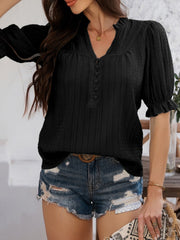 Black textured puff sleeve blouse with V-neck and button detail
